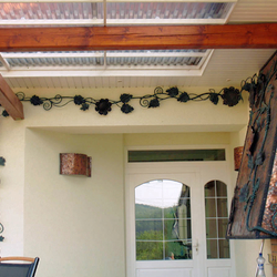 Exklusive Sonnenblume als Dekoration eines Kamins - geschmiedete Beleuchtungen Exklusive Sonnenblume als Dekoration eines Kamins - geschmiedete Beleuchtungen