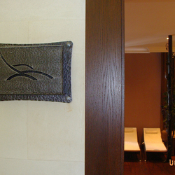 Schmiedeeisernes Türschild für den Wellnessbereich Schmiedeeisernes Türschild für den Wellnessbereich