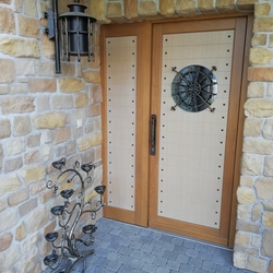 Wandlampe aus Schmiedeeisen, Kerzenhalter, Gitter und Türgriff Wandlampe aus Schmiedeeisen, Kerzenhalter, Gitter und Türgriff